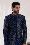 Tira by Naresh Raj_Blue Raw Silk Embroidered Lotus Pond Sherwani Set _at_Aza_Fashions