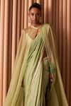 Rishi and Vibhuti_Green Chiffon Embroidery Sequin Blouse Plunging V Blossom Work Cape Saree Set _Online_at_Aza_Fashions