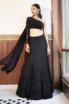 Buy_MEHAK SHARMA_Black Georgette Embellished Crystal One Shoulder Lehenga Set_at_Aza_Fashions