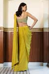 Shop_MEHAK SHARMA_Green Satin Embellished Crystal Sweetheart Solid Pre Draped Saree With Blouse_at_Aza_Fashions