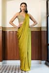 MEHAK SHARMA_Green Satin Embellished Crystal Sweetheart Solid Pre Draped Saree With Blouse_at_Aza_Fashions