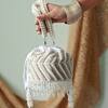 The Tan Clan_White Pearls, Cut Work Petite Embroidered Mini Potli Bag _at_Aza_Fashions