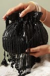 The Tan Clan_Black Beads Twinkle Embellished Potli _at_Aza_Fashions