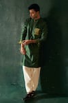 Shop_Charkhee_Green Chanderi, Poplin, Silk Half Stripe Pattern Bundi Kurta Set _at_Aza_Fashions