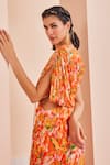 Mandira Wirk_Orange Chiffon Printed Abstract One Shoulder Dress_at_Aza_Fashions