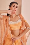 Shop_Mandira Wirk_Orange Chiffon Printed Abstract Sweetheart Pattern Cape Skirt Set _Online_at_Aza_Fashions