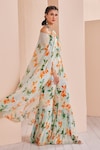 Mandira Wirk_Green Chiffon Printed Floral Halter Draped Jumpsuit_Online_at_Aza_Fashions