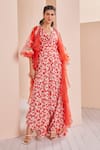 Buy_MANDIRA WIRK - Indian_Red Satin Printed Floral Cowl Neck Jumpsuit With Ruffle Cape _at_Aza_Fashions