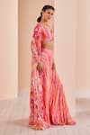 Mandira Wirk_Pink Chiffon Printed Striped Blouse V Neck Sharara Set With Floral Pattern Cape _Online_at_Aza_Fashions