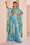 Buy_Mandira Wirk_Sky Blue Chiffon Printed Floral Blouse V Neck Cape Sharara Set _at_Aza_Fashions