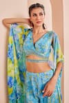 Shop_Mandira Wirk_Sky Blue Chiffon Printed Floral Blouse V Neck Cape Sharara Set _at_Aza_Fashions