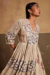 Cord_Ivory Cotton Printed And Embroidered Spiral Surplice Neck Poem & Floral Dress _at_Aza_Fashions