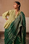 Cord_Emerald Green Cotton Printed And Embroidered Spiral & Thread Smocked Saree_at_Aza_Fashions