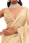 Payal & Zinal_Gold Rim Zim Zari Embellished Pearl Plunge V Neck Saree With Blouse _Online_at_Aza_Fashions