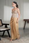 Saniya Sharma_Gold Corset Organza Embellished Crystal Sweetheart Neck With Draped Skirt _at_Aza_Fashions