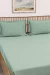 Buy_House This_Green Cotton Satin Sage Solid Fitted Bedsheet Set _at_Aza_Fashions