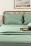 Shop_House This_Green Cotton Satin Sage Solid Fitted Bedsheet Set _at_Aza_Fashions