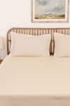 Buy_House This_Off White Cotton Satin Sesame Solid Fitted Bedsheet Set _Online_at_Aza_Fashions