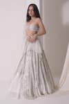 Shop_Shwetanga_White Crepe Embellished Sequin Asymmetric Layered Lehenga Bustier Set _Online_at_Aza_Fashions