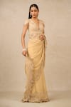 Buy_Tarun Tahiliani_Gold Embroidery Floral Cutwork Border Saree With Blouse_at_Aza_Fashions