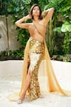 Buy_Nirmooha_Gold Lurex, Foil Lycra Sequins Halter Criss Cross Top And Skirt Set _Online_at_Aza_Fashions