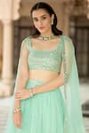 Esha Koul_Blue Semi Crepe Embroidered Mirror Square Neck Cape Lehenga Set _at_Aza_Fashions