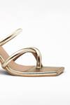 Shop_Signature Sole_Gold Plain Cross Strap Metallic Block Heels_Online_at_Aza_Fashions