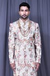 Aryavir Malhotra_Off White Satin Silk Embroidered Floral And Thread Sherwani Set _Online_at_Aza_Fashions