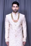 Aryavir Malhotra_Peach Satin Silk Embroidered Floral Thread And Sherwani Set _Online_at_Aza_Fashions