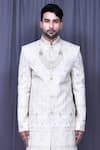 Aryavir Malhotra_Beige Sherwani Banglori Silk Embroidered Floral And Thread Work Set _Online_at_Aza_Fashions