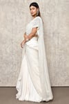 Ritika Mirchandani_Ivory Crepe Embroidery Thread Leaf Neck Lehenga Saree With Blouse  _Online_at_Aza_Fashions