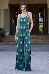 Amrood_Green Modal Satin Printed Chevron Halter Neck Jumpsuit _Online_at_Aza_Fashions