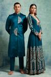 Vedika Soni_Blue Satin Embroidery Floral Placed Sherwani Pant Set _at_Aza_Fashions