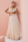 Buy_Awigna_Ivory Organza, Net Embroidery, Tassels Shawl Neck Jacket Lehenga Set_at_Aza_Fashions