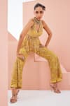 Shop Awigna Yellow Net, Organza, Linen Sequins, Pearls, Embroidered Peplum Tunic Pant Set at Aza Fashions Shop_Awigna_Yellow Net, Organza, Linen Sequins, Pearls, Embroidered Peplum Tunic Pant Set _at_Aza_Fashions