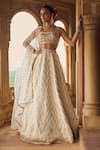 Buy_LASHKARAA_White Brocade Embroidery Thread Square Floral Chevron Pattern Bridal Lehenga Set_at_Aza_Fashions