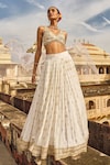 Buy_LASHKARAA_White Brocade Embroidery Thread V Neck Mandala Pattern Lehenga Set_at_Aza_Fashions