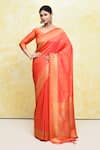 Buy_Samyukta Singhania_Orange Silk Woven Round Handloom Saree With Blouse _at_Aza_Fashions