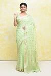 Buy_Samyukta Singhania_Green Modal Poly Viscose Woven V Neck Handloom Saree With Blouse _at_Aza_Fashions