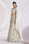 Divya Aggarwal_Ivory Silk Hand Embroidered Pearls Leaf Neck Blouse Bridal Lehenga Set _Online_at_Aza_Fashions