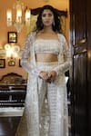 Buy_Vikram Phadnis_Ivory Net Hand Embroidered Sequins Bustier Cape With Bell Bottom Pant Set _at_Aza_Fashions