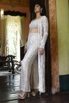 Shop_Vikram Phadnis_Ivory Net Hand Embroidered Sequins Bustier Cape With Bell Bottom Pant Set _at_Aza_Fashions