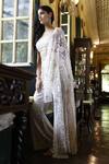 Vikram Phadnis_Ivory Net Hand Embroidered Sequins Bustier Cape With Bell Bottom Pant Set _Online_at_Aza_Fashions