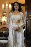 Buy_Vikram Phadnis_Ivory Net Hand Embroidered Sequins Bustier Cape With Bell Bottom Pant Set _Online_at_Aza_Fashions