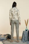 Shop_SVA by Sonam & Paras Modi_Ivory Silk Woven And Embellished Art Deco High Neck Jacket & Pant Set_at_Aza_Fashions