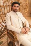 Shop_Sva By Sonam & Paras Modi_Beige Silk, Cotton Sequins French Knot Embellished Sherwani With Pant _at_Aza_Fashions
