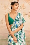 Shop_LASHKARAA_White Georgette Printed Floral Leaf Neck Pre-draped Ruffle Saree With Blouse _at_Aza_Fashions