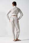 Shop_OFRIDA_White Cotton Plain Jogger Pant_at_Aza_Fashions
