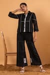 Buy_Savaaya_Black Linen Blend Embroidery Pipe Spread Shirt And Flared Pant Set  _at_Aza_Fashions