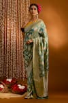 Priyal Bhardwaj_Green Banarasi Silk Handwoven Rose And Geometric Pattern Saree_Online_at_Aza_Fashions
